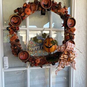 Festive Halloween Wreath with Pumpkins and Bows